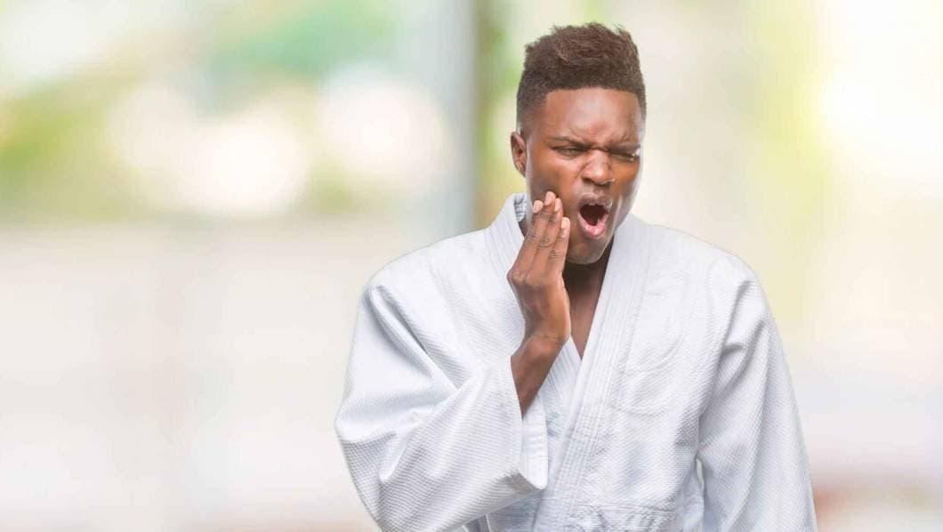 Deportista con dolor bucal