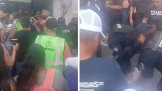 Altercado captado en video en Carnaval de Jiutepec termina con mujer sometida por policías