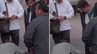 Polémica por video: colaboradores limpian zapatos al ministr...