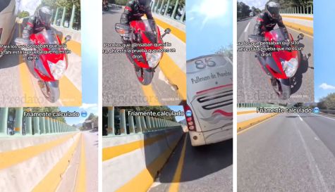 motociclista desafía la muerte.jpg
