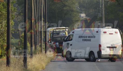 Mujer es hallada sin vida con herida de bala en campos de Tetelpa